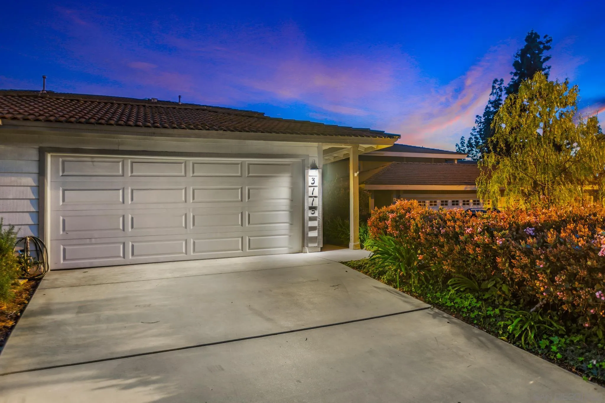 3115 Via De Caballo Encinitas, CA 92024 - Photo 1 of 39 a front view of a house with a yard