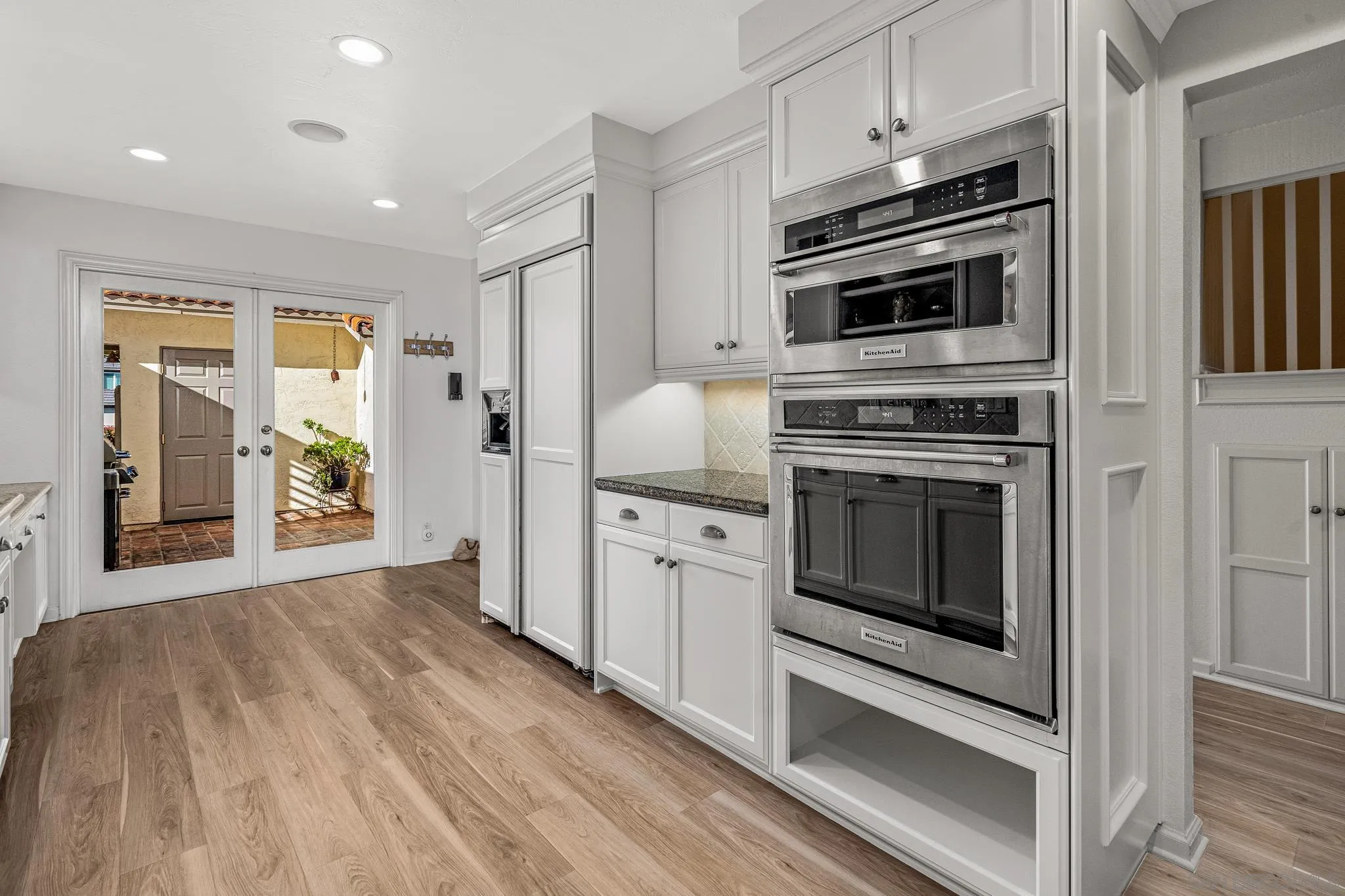 3115 Via De Caballo Encinitas, CA 92024 - Photo 13 of 39 a kitchen with a stove oven and sink