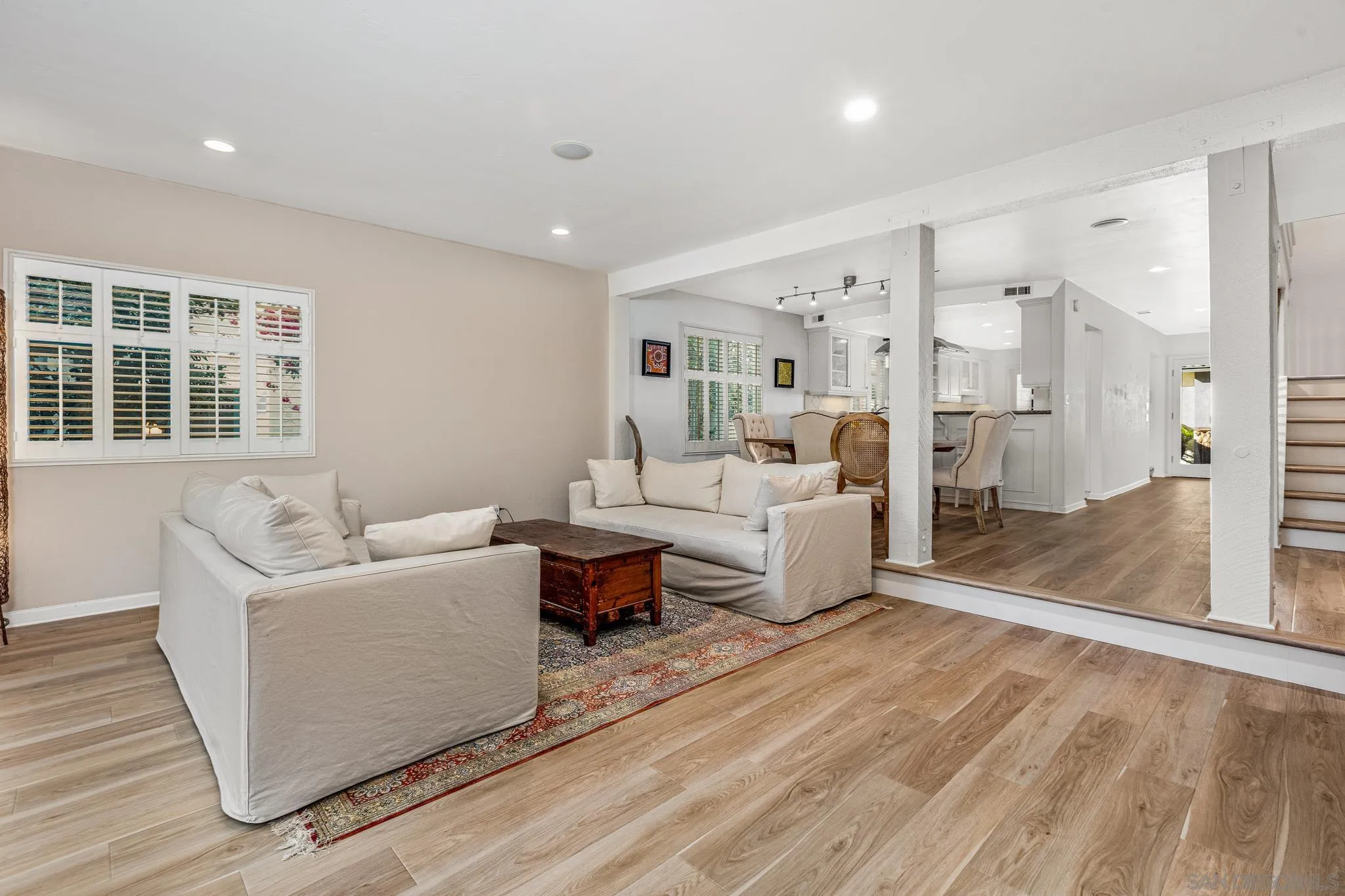 3115 Via De Caballo Encinitas, CA 92024 - Photo 17 of 39 a living room with furniture and a large window