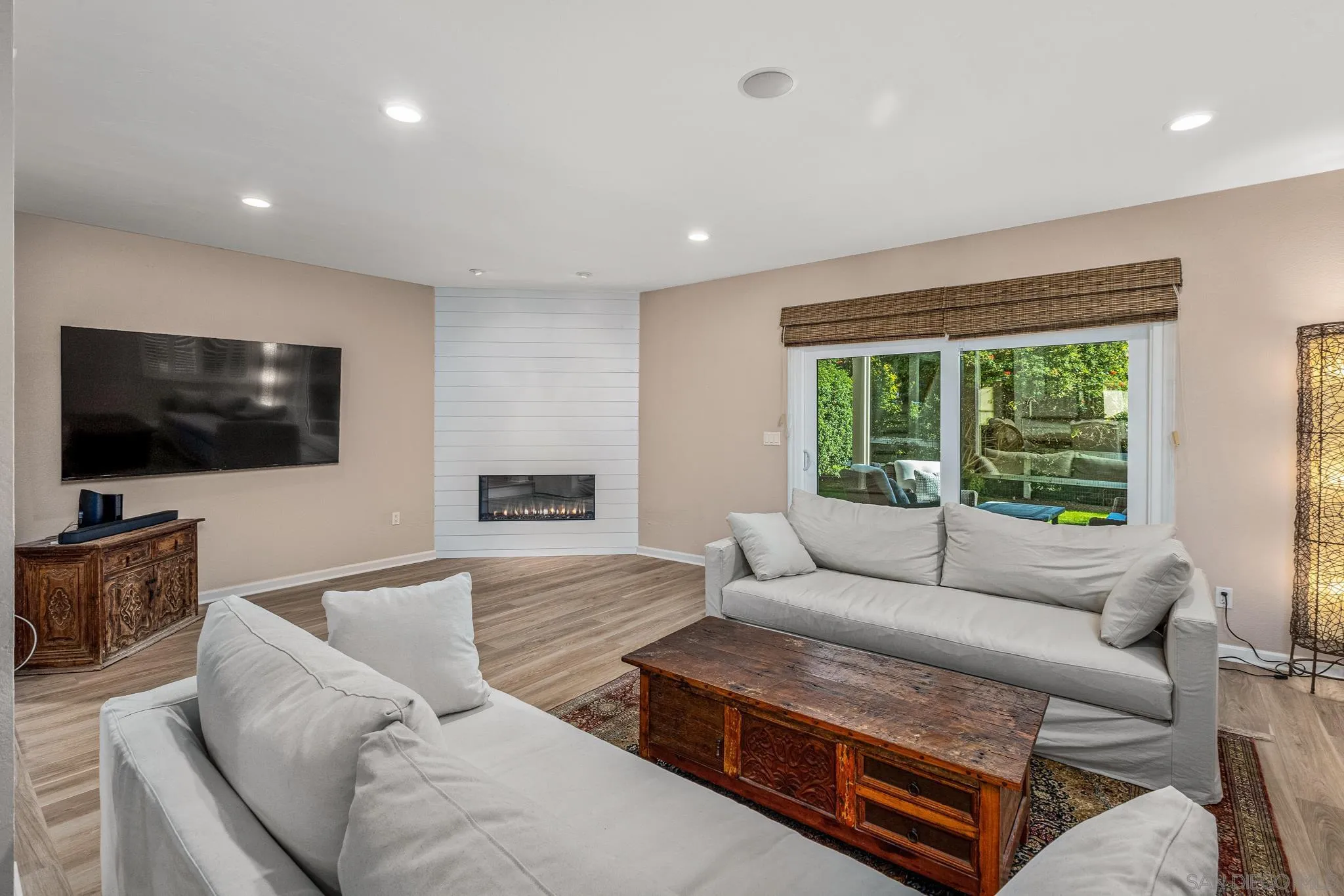 3115 Via De Caballo Encinitas, CA 92024 - Photo 20 of 39 a living room with furniture and a flat screen tv
