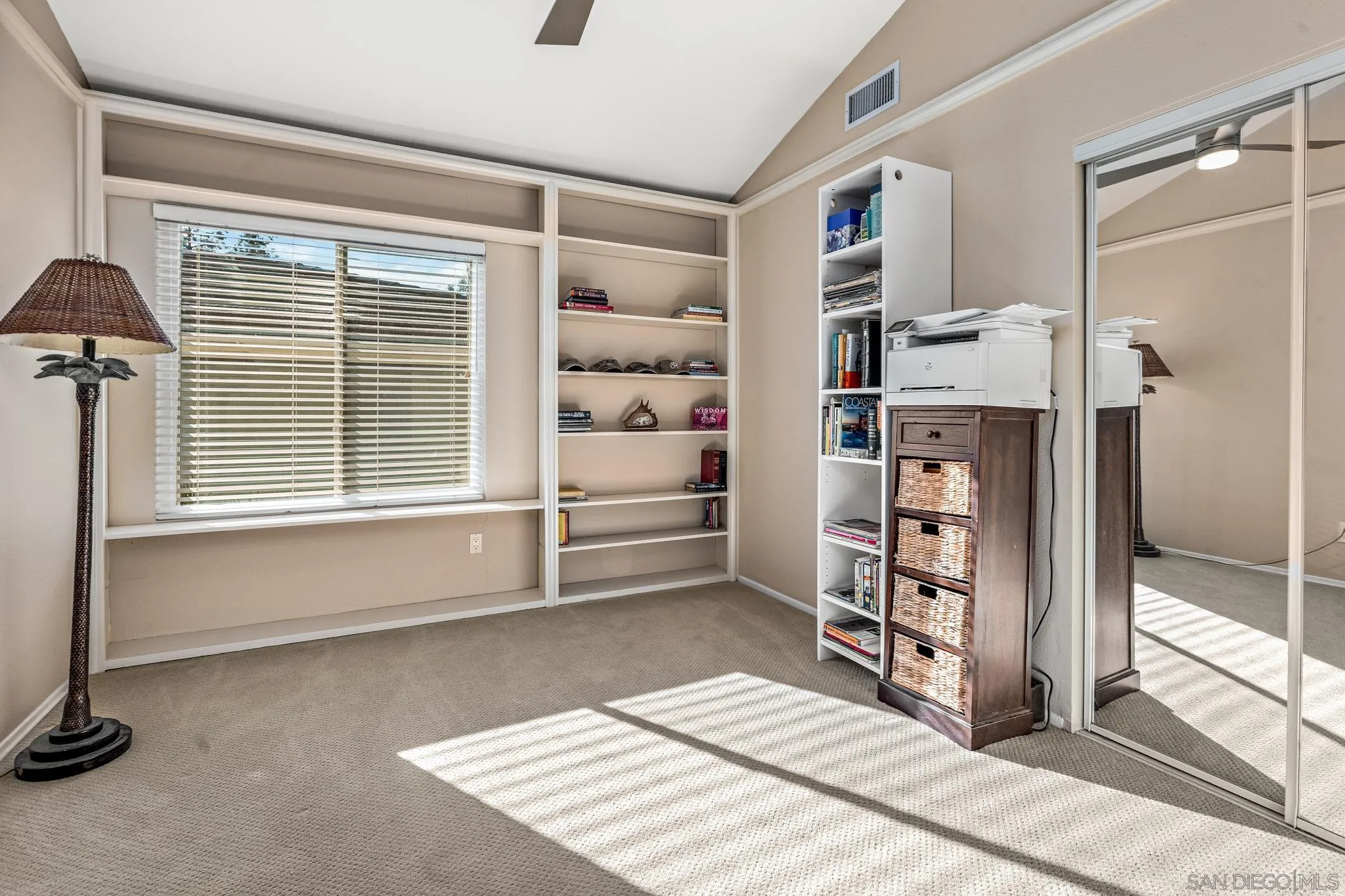 3115 Via De Caballo Encinitas, CA 92024 - Photo 31 of 39 a bedroom with a bed and a window