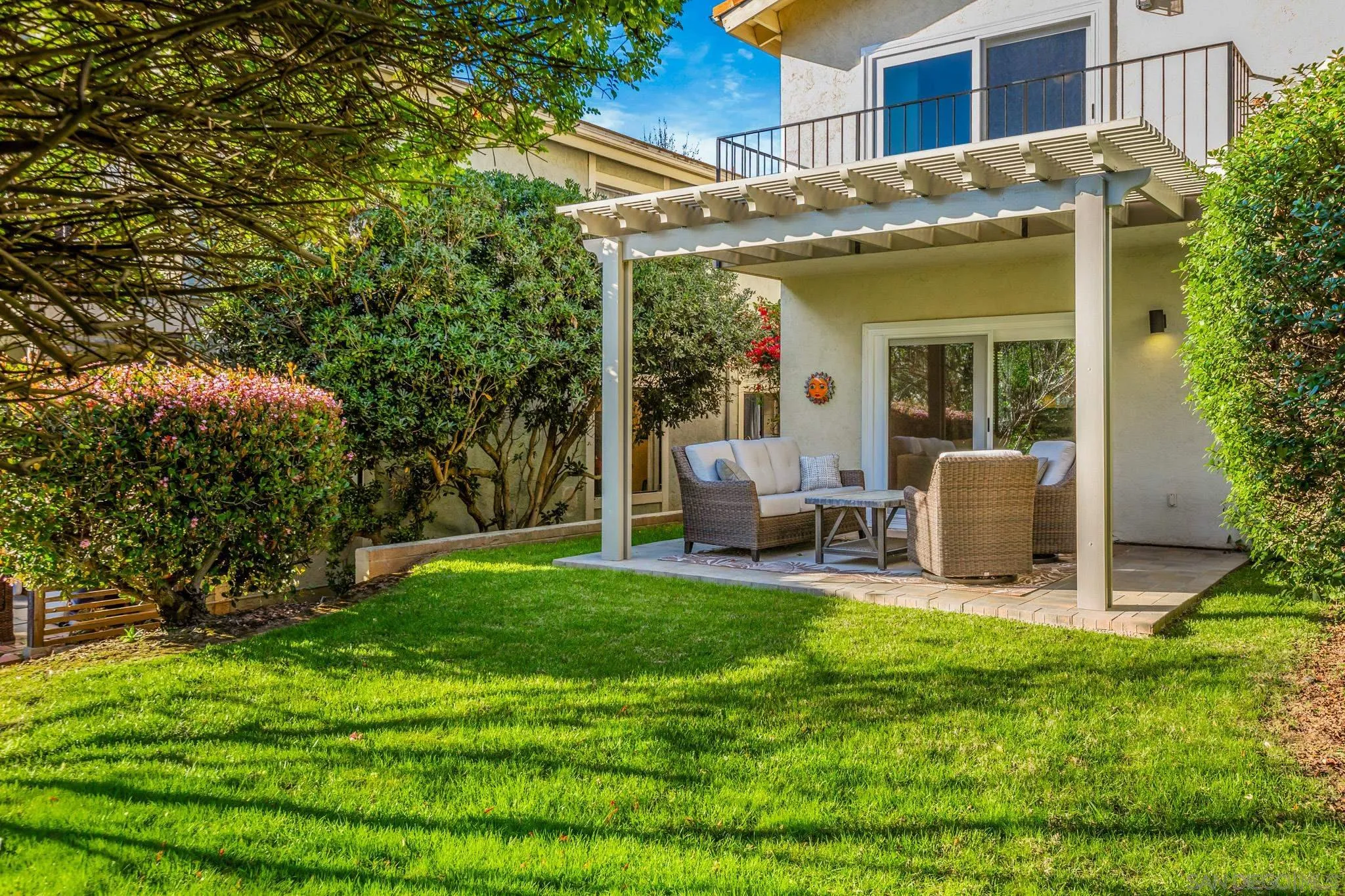 3115 Via De Caballo Encinitas, CA 92024 - Photo 34 of 39 a view of a house with backyard porch and sitting area