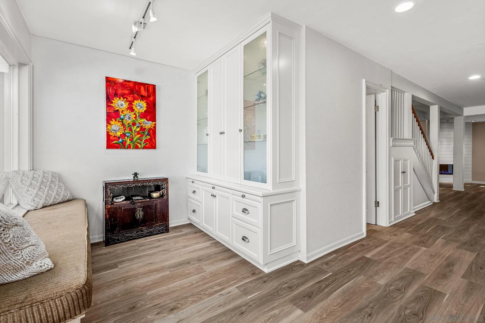 3115 Via De Caballo Encinitas, CA 92024 - Photo 9 of 39 a hall with cabinets and wooden floor