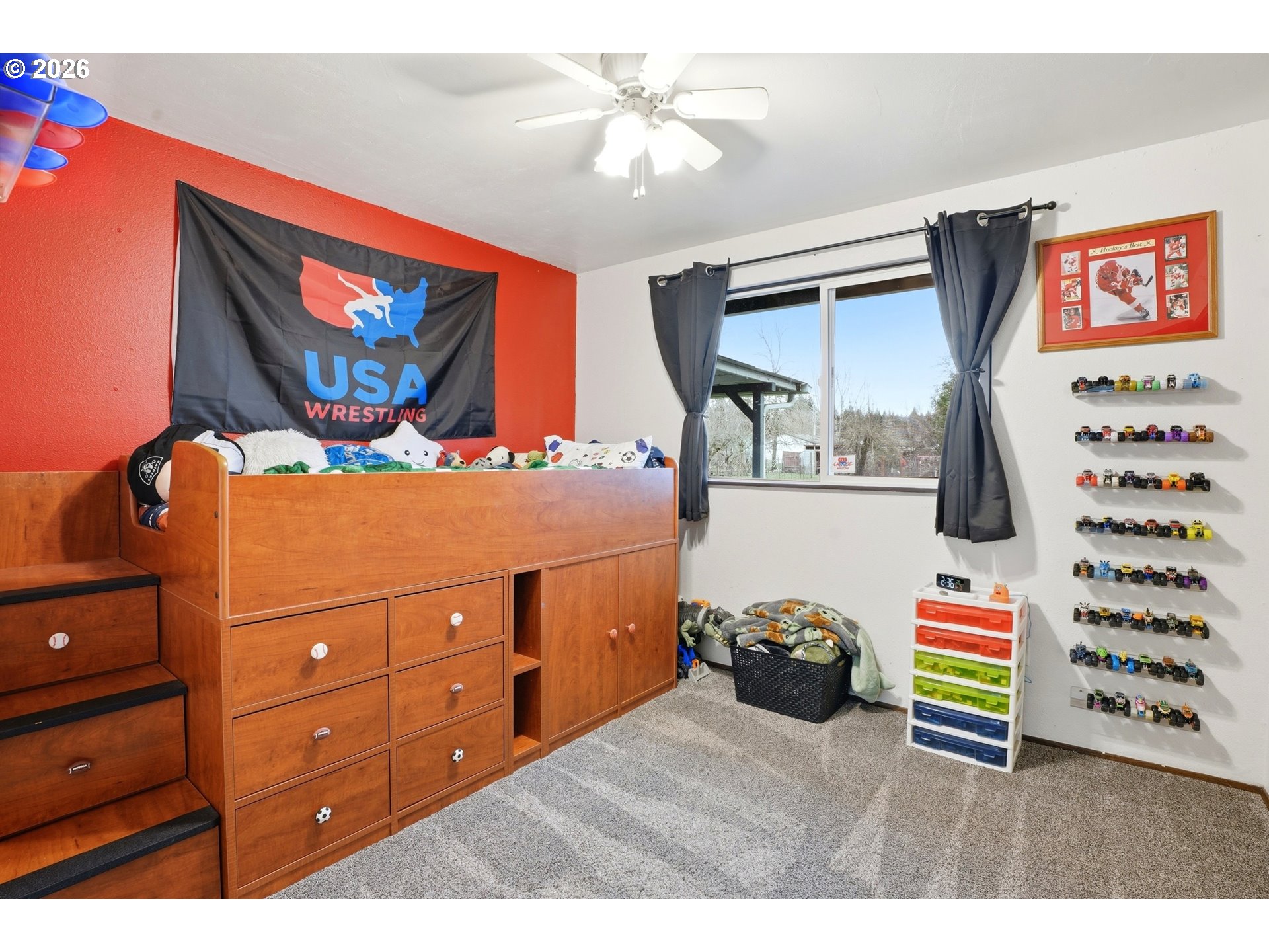 224 6th Street Dayton, OR 97114 - Photo 17 of 37 a bedroom with a bed and a chandelier