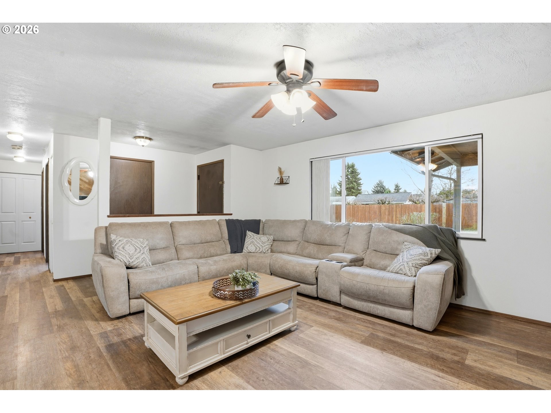 224 6th Street Dayton, OR 97114 - Photo 2 of 37 a living room with furniture and a large window