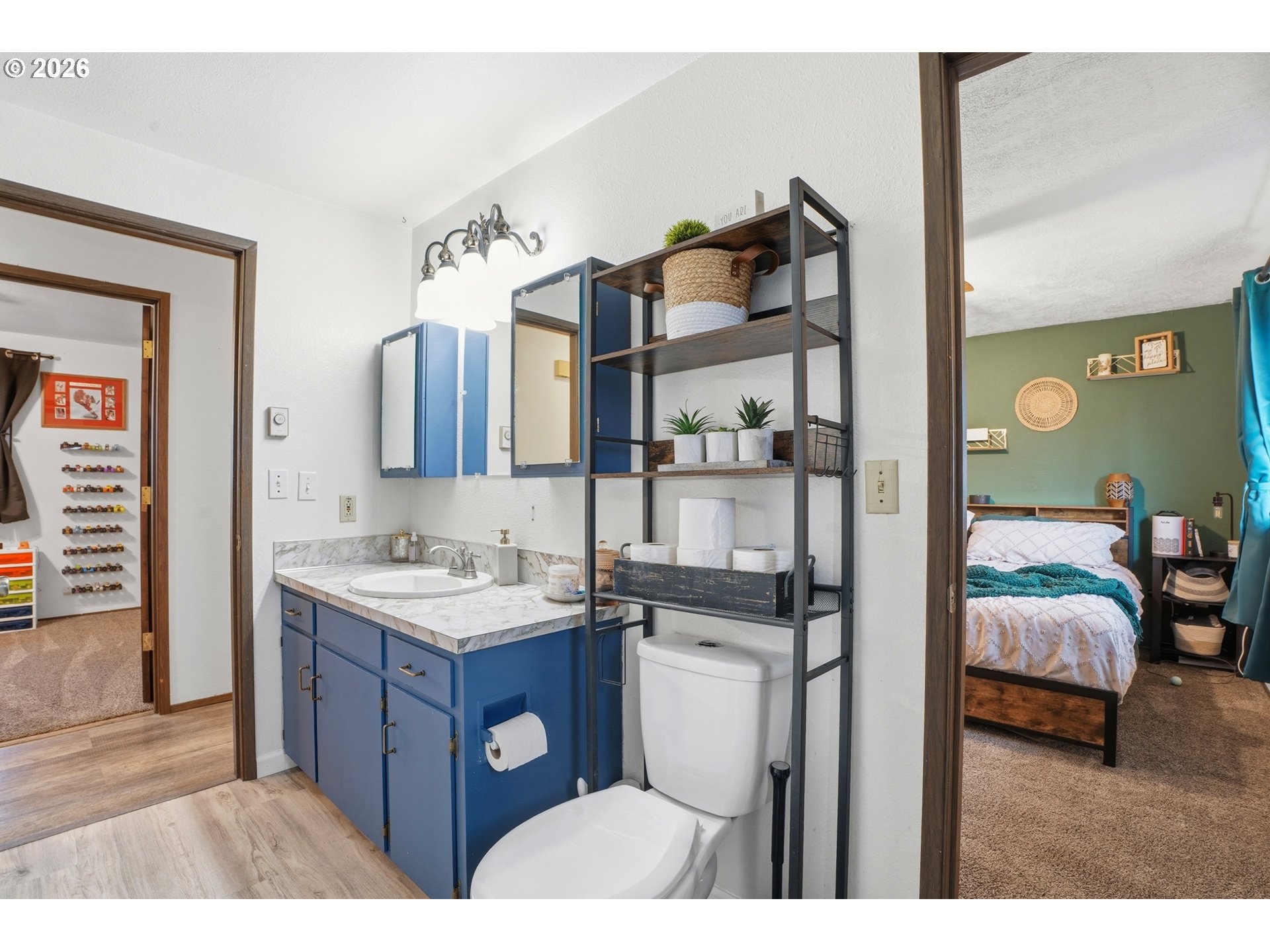 224 6th Street Dayton, OR 97114 - Photo 22 of 37 a en suite bathroom with a sink vanity and mirror