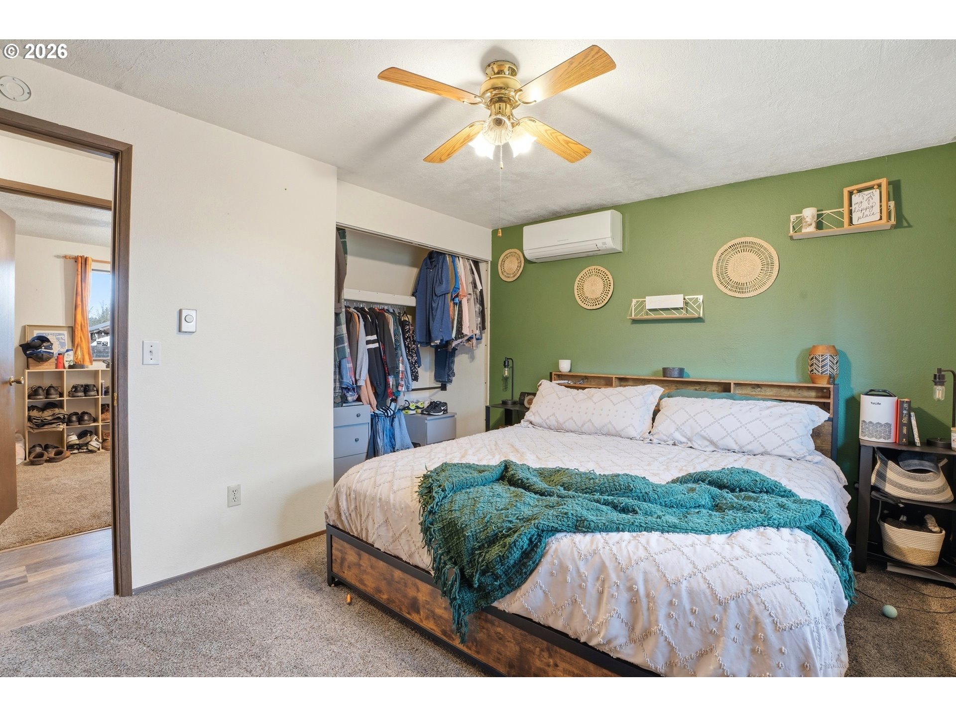 224 6th Street Dayton, OR 97114 - Photo 24 of 37 a bedroom with a bed and a bookshelf with a bookshelf