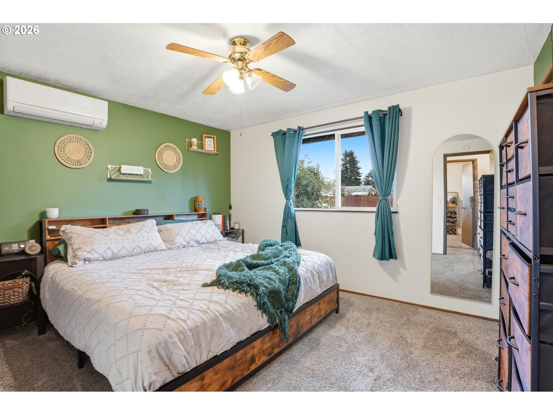 224 6th Street Dayton, OR 97114 - Photo 25 of 37 a bedroom with a bed mirror and a window