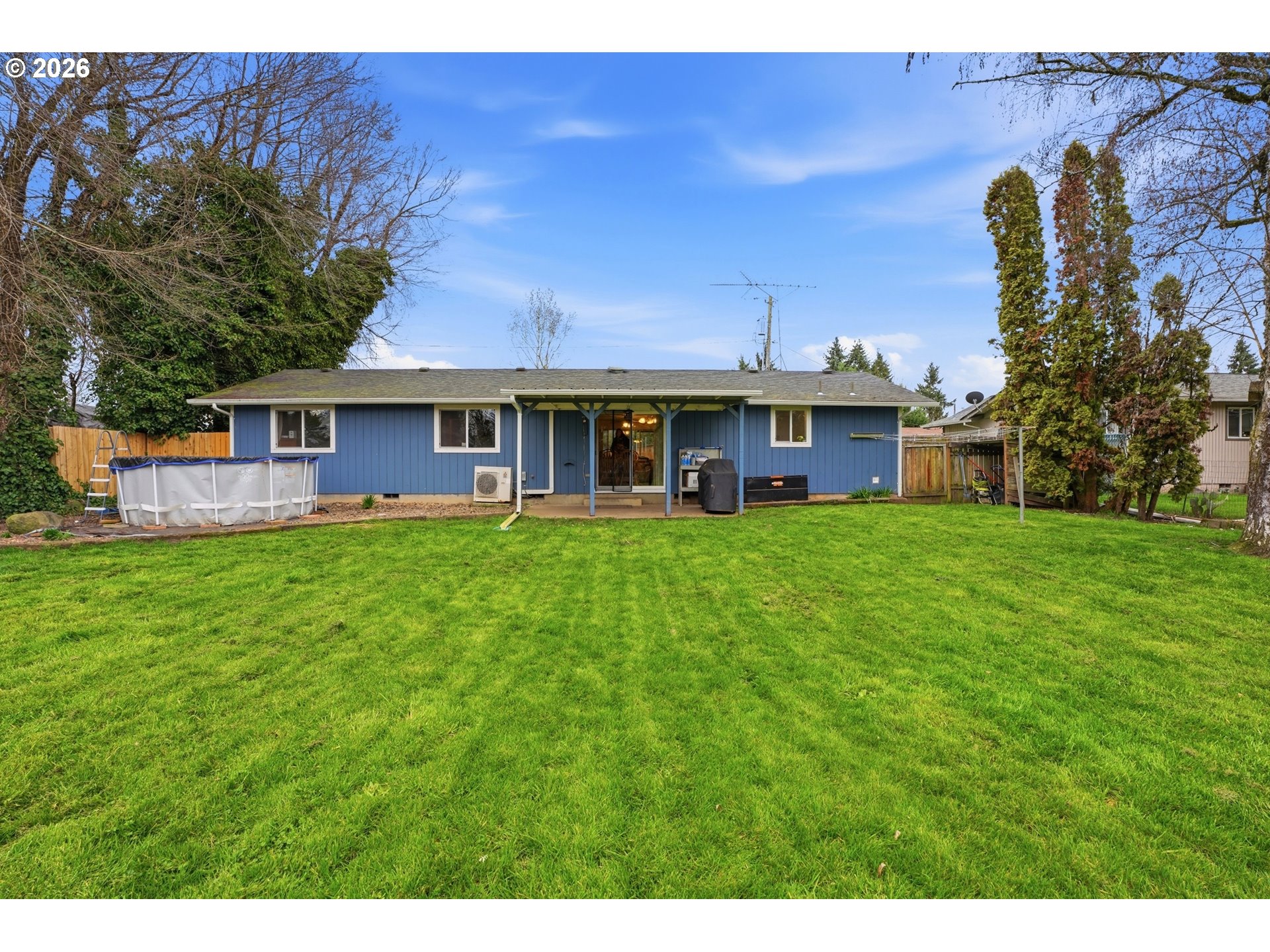 224 6th Street Dayton, OR 97114 - Photo 27 of 37 a view of a house with a yard table and chairs