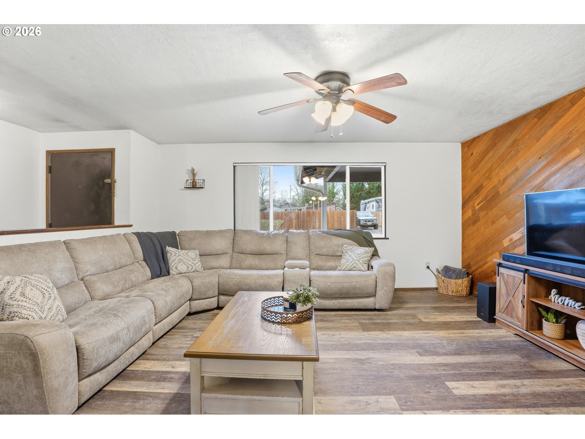 224 6th Street Dayton, OR 97114 - Photo 3 of 37 a living room with furniture a rug and a chandelier