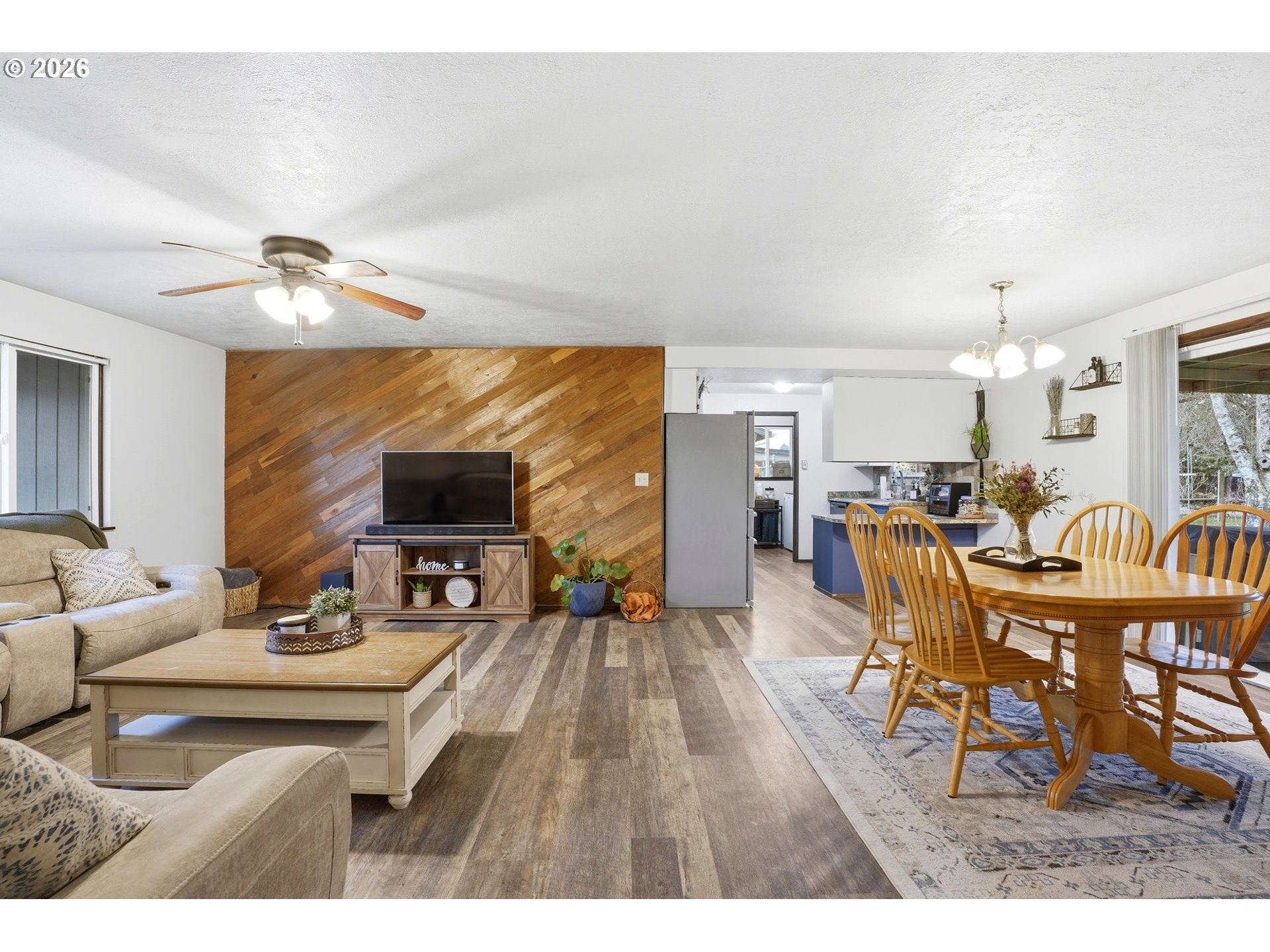 224 6th Street Dayton, OR 97114 - Photo 5 of 37 a living room with furniture and a flat screen tv