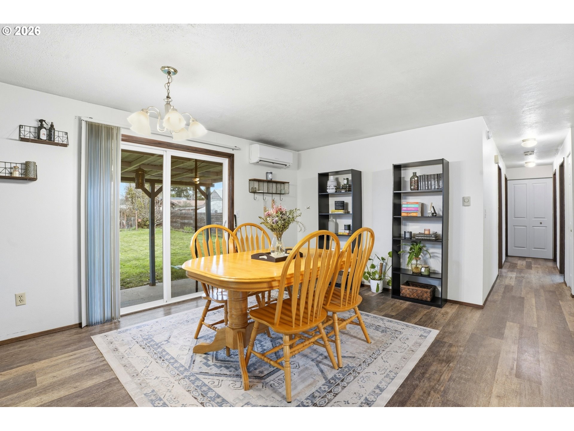 224 6th Street Dayton, OR 97114 - Photo 8 of 37 a view of a dining room with furniture window and wooden floor