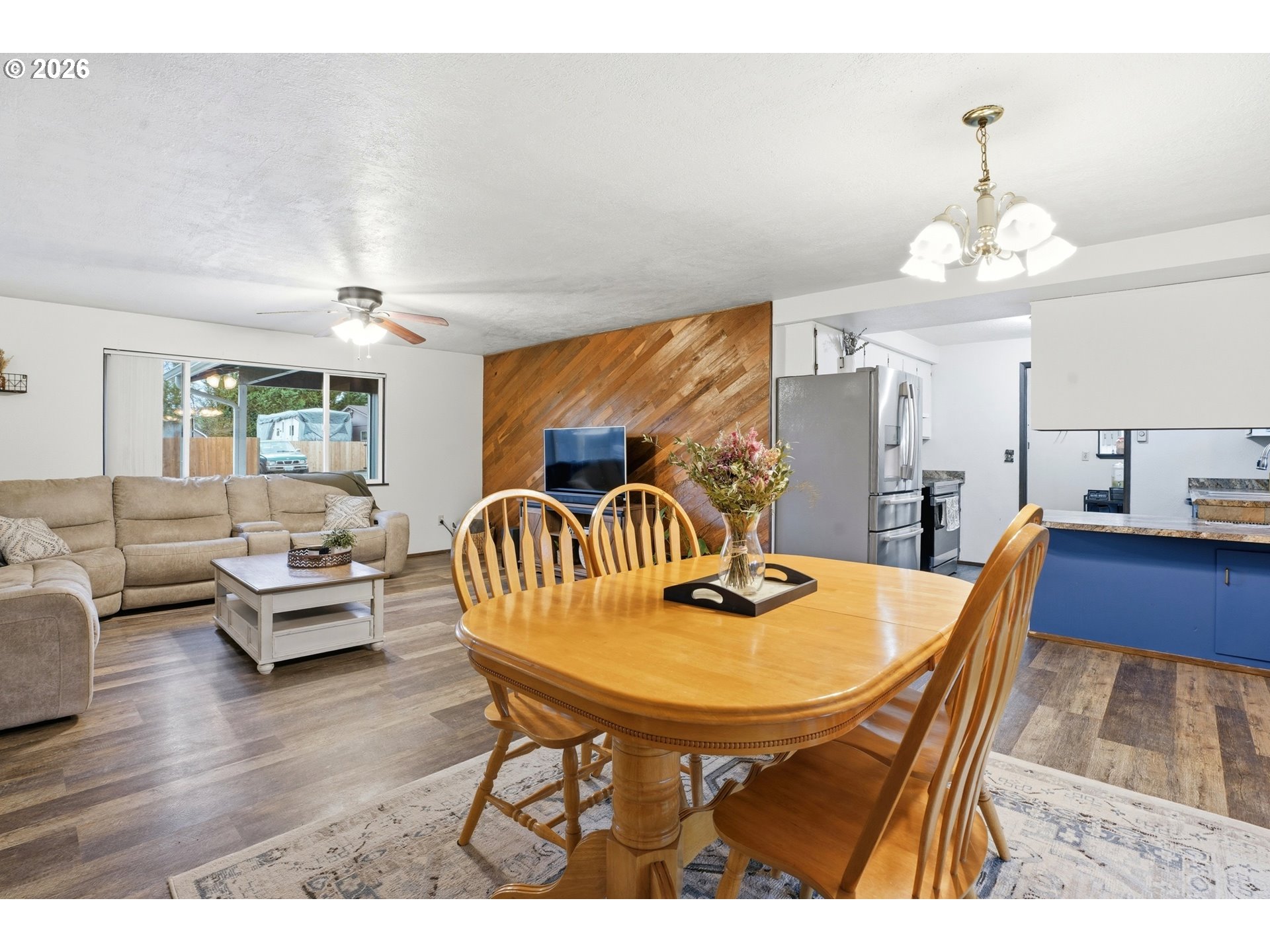 224 6th Street Dayton, OR 97114 - Photo 9 of 37 a dining room with furniture a chandelier and wooden floor