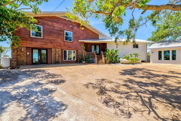 a front view of a house with a outdoor space