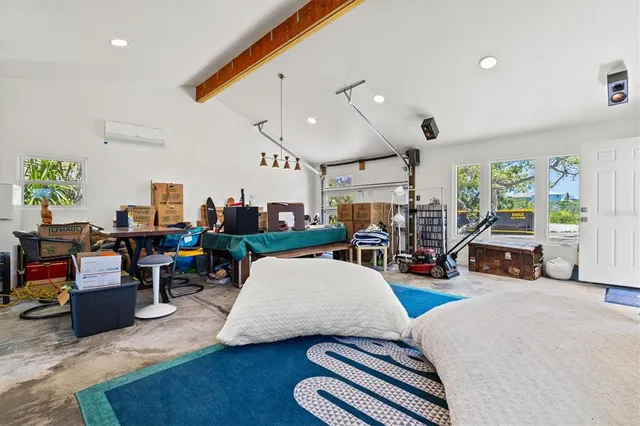 a room with furniture and a wooden floor