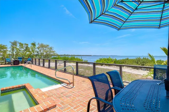a view of a chairs and table on the terrace