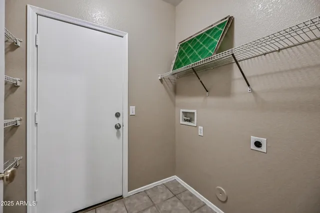 a view of an empty room with windows