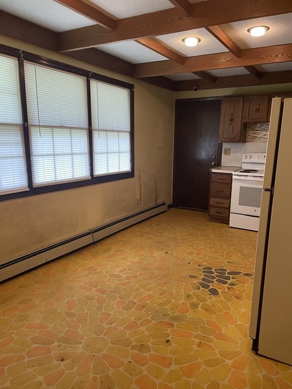 59 Beebe Road Monson, MA 01057 - Photo 3 of 14 a view of an empty room with a window