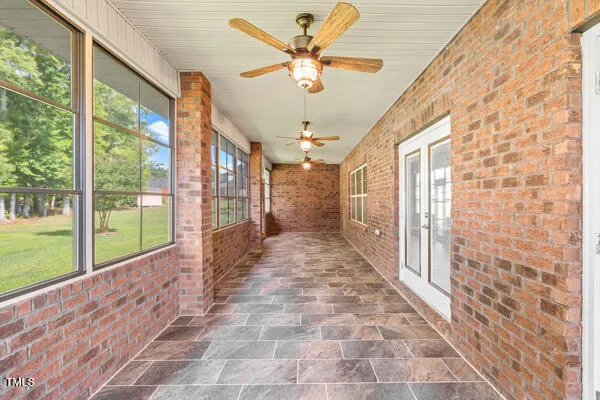 a view of house with backyard