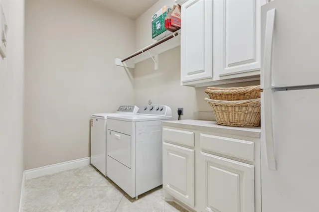 a view of swimming pool with outdoor seating and patio