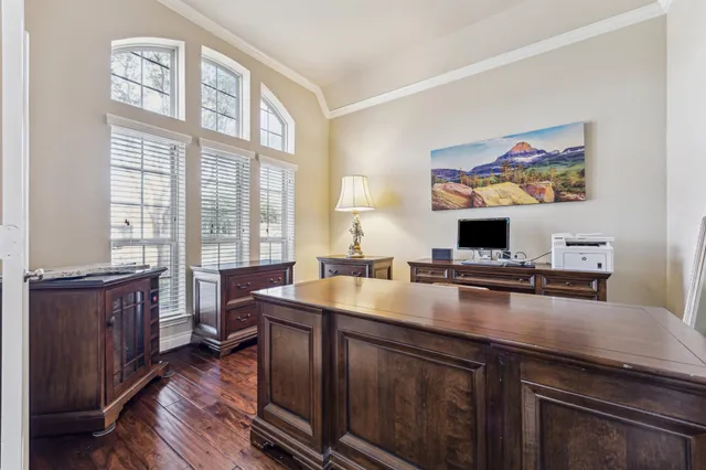 a view of a living room and dining room