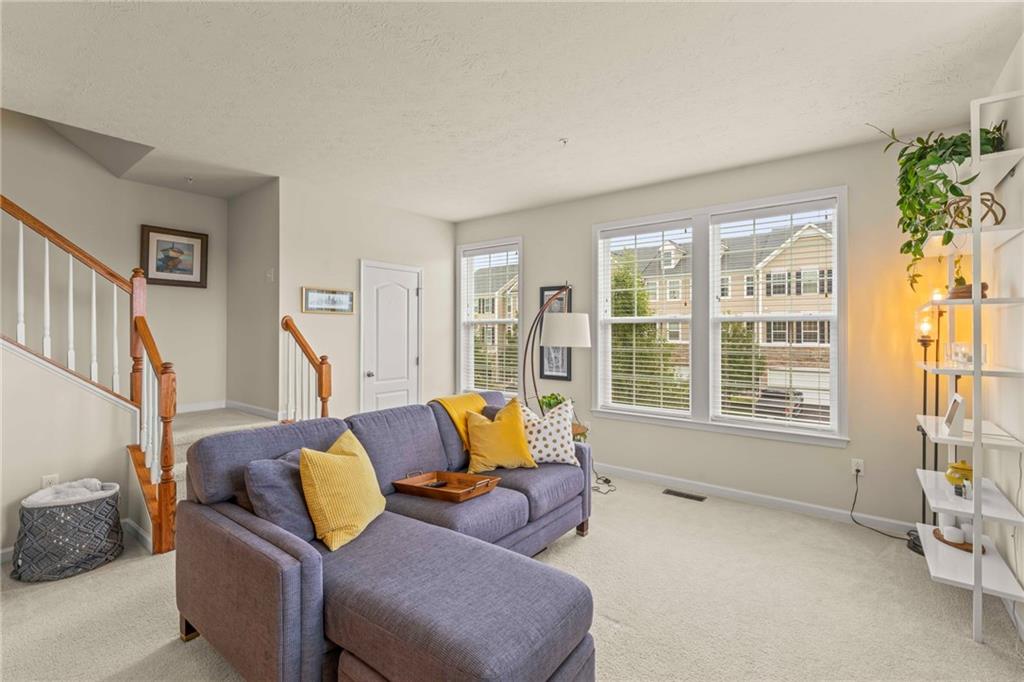 2 Truman Circle McKees Rocks, PA 15136 - Photo 13 of 26 a living room with furniture and a window