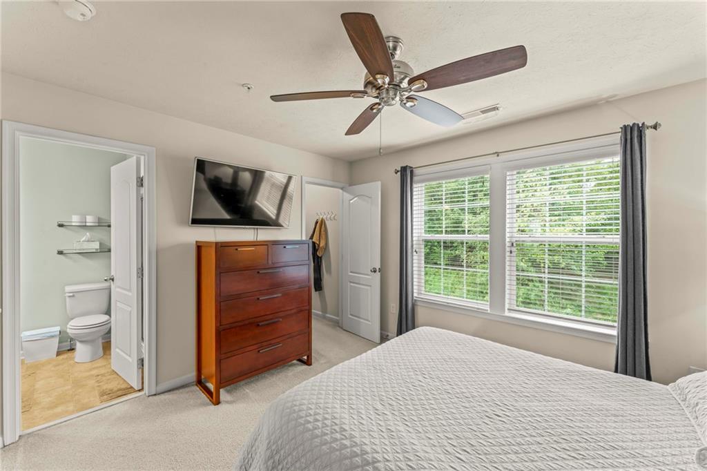 2 Truman Circle McKees Rocks, PA 15136 - Photo 15 of 26 a bedroom with a bed and a flat screen tv