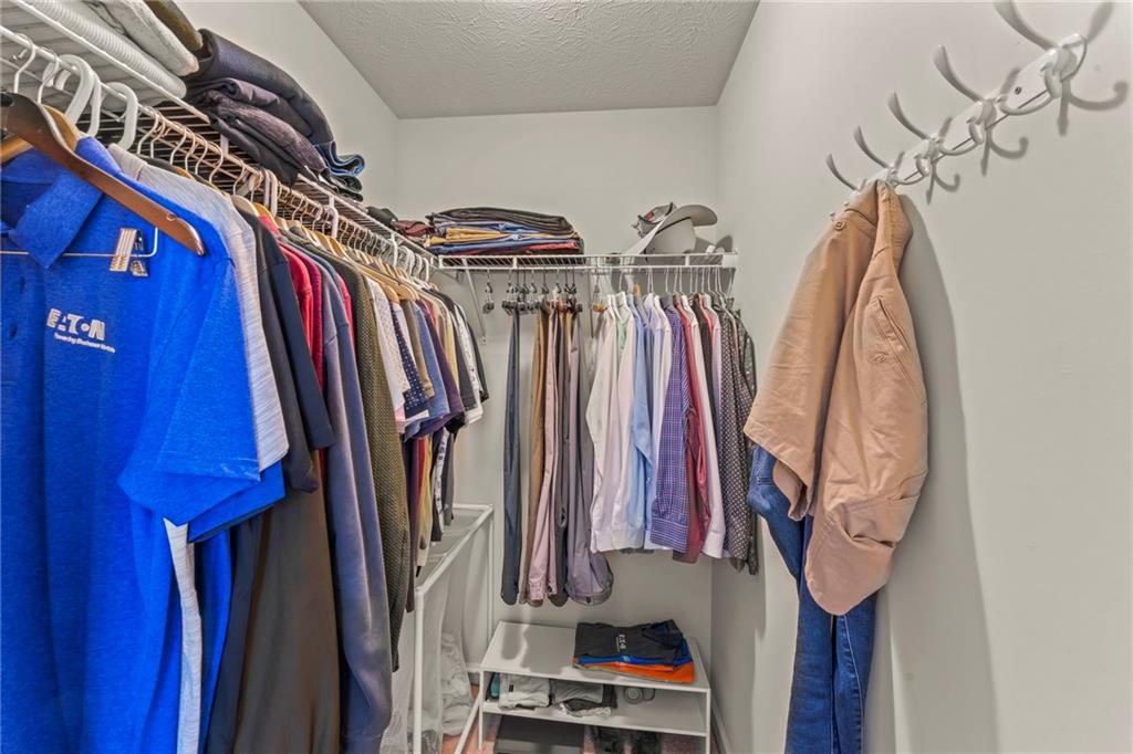 2 Truman Circle McKees Rocks, PA 15136 - Photo 17 of 26 a view of walk in closet with clothes and shoes