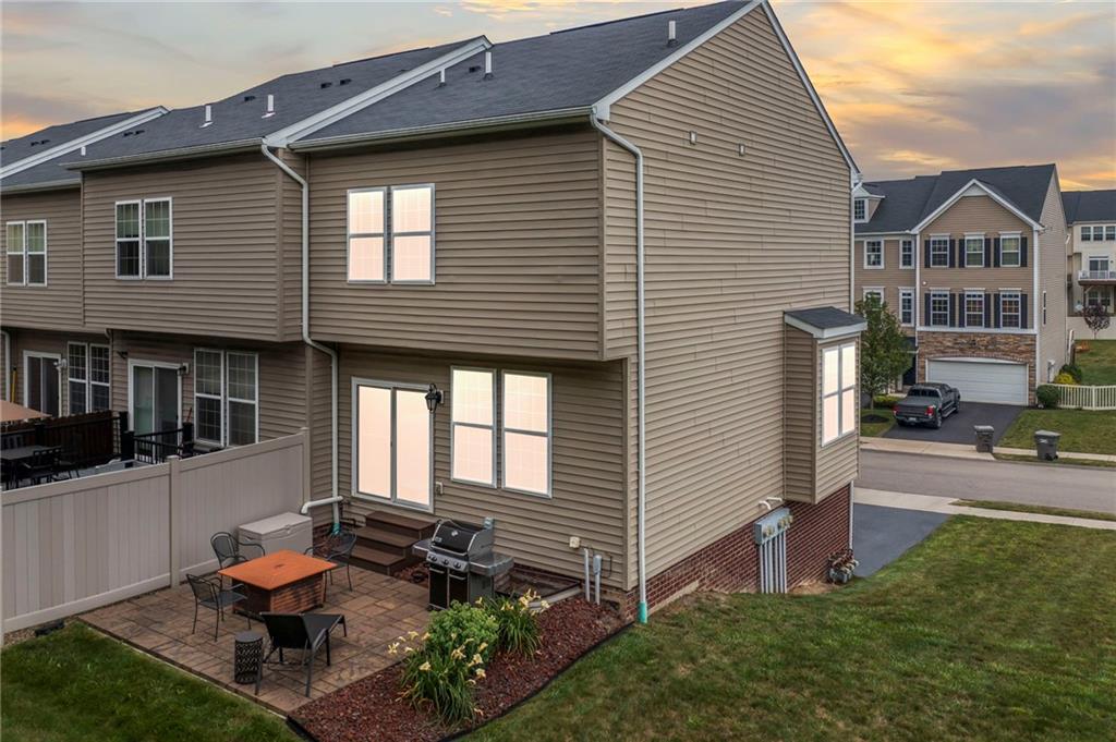 2 Truman Circle McKees Rocks, PA 15136 - Photo 22 of 26 a backyard of a house with seating space