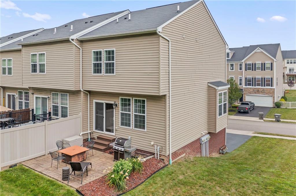 2 Truman Circle McKees Rocks, PA 15136 - Photo 23 of 26 a view of a house with backyard and sitting area