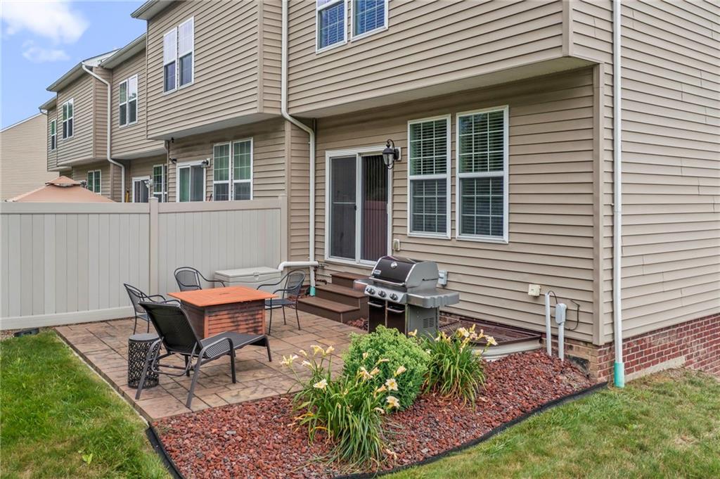 2 Truman Circle McKees Rocks, PA 15136 - Photo 24 of 26 a view of a house with a backyard and sitting area