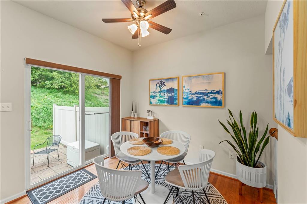 2 Truman Circle McKees Rocks, PA 15136 - Photo 6 of 26 a dining room with furniture a window and a potted plant