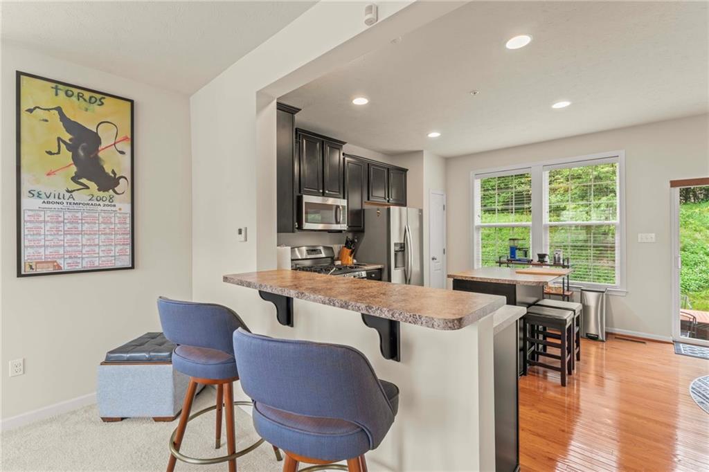 2 Truman Circle McKees Rocks, PA 15136 - Photo 10 of 26 a view of a dining room with furniture window and outside view