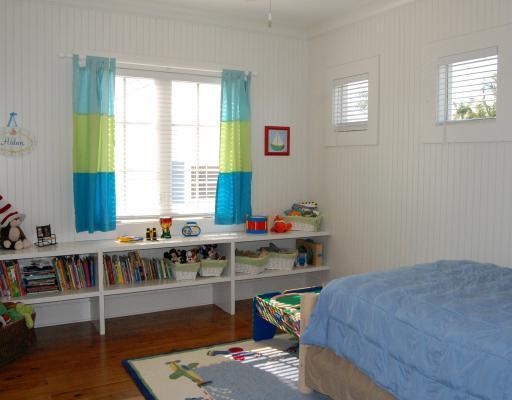 5575 Pennock Point Road Jupiter, FL 33458 - Photo 11 of 16 a bedroom with furniture and a window