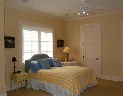 5575 Pennock Point Road Jupiter, FL 33458 - Photo 14 of 16 a bedroom with two beds and a window