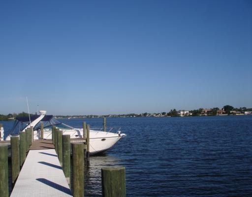 5575 Pennock Point Road Jupiter, FL 33458 - Photo 3 of 16 a view of a terrace with chairs