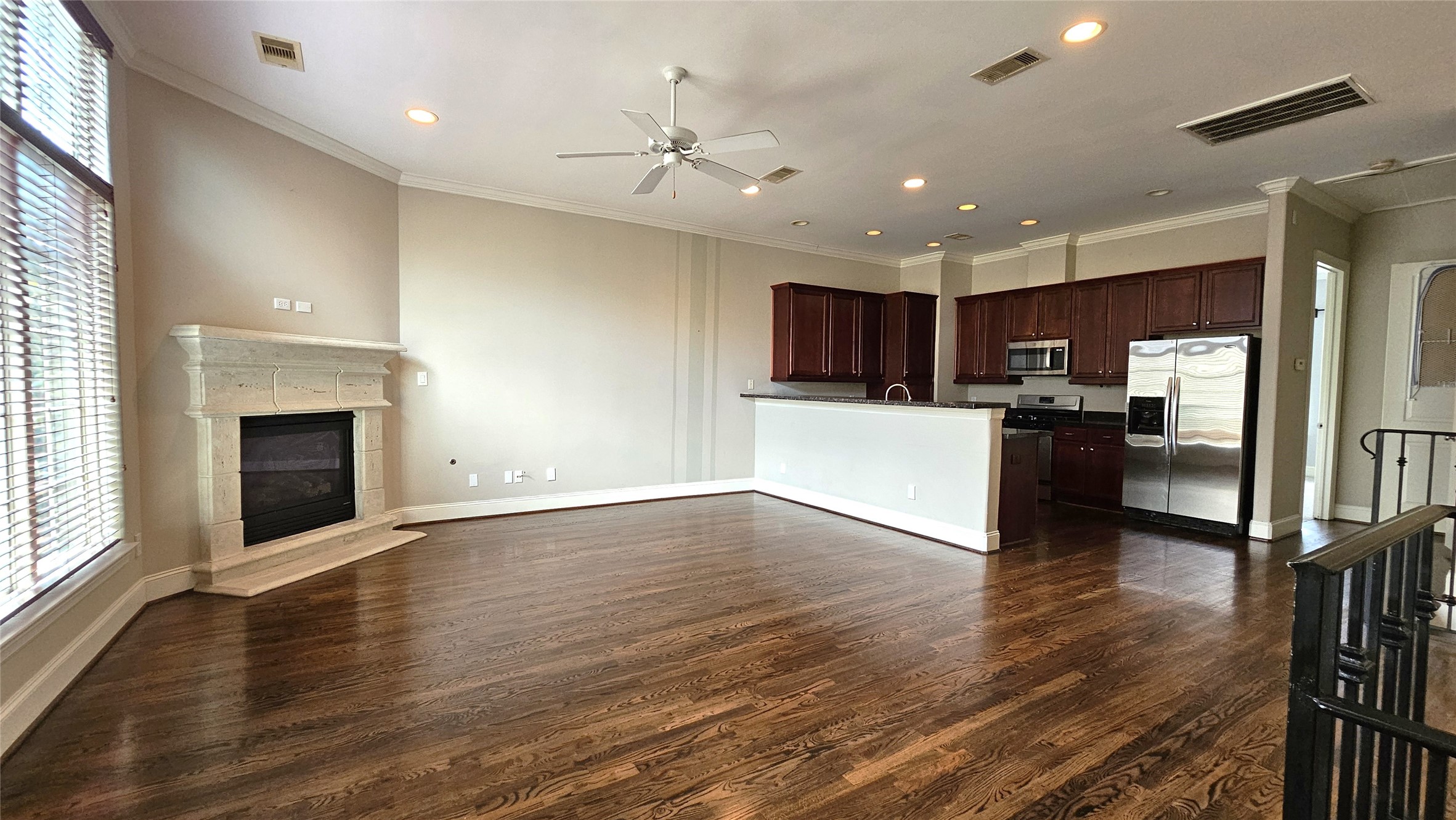 902 West 23rd Street, Unit I Houston, TX 77008 - Photo 3 of 36 a view of a kitchen with a sink and a large window