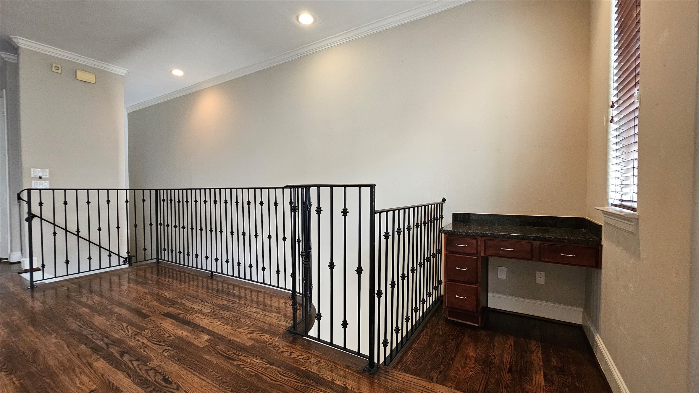 902 West 23rd Street, Unit I Houston, TX 77008 - Photo 5 of 36 a view of a hallway with wooden floor and staircase