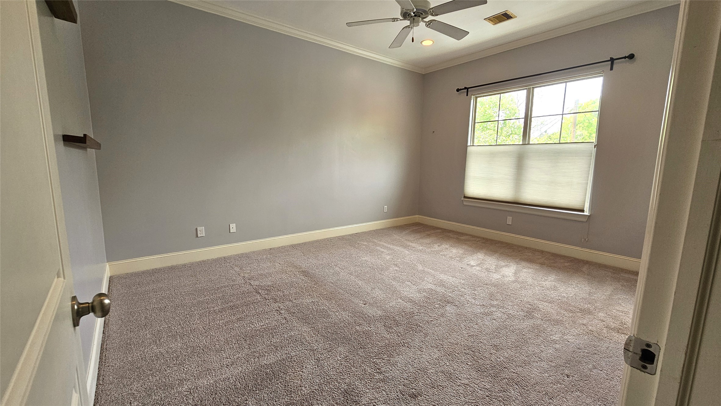 902 West 23rd Street, Unit I Houston, TX 77008 - Photo 7 of 36 wooden floor and window in an empty room