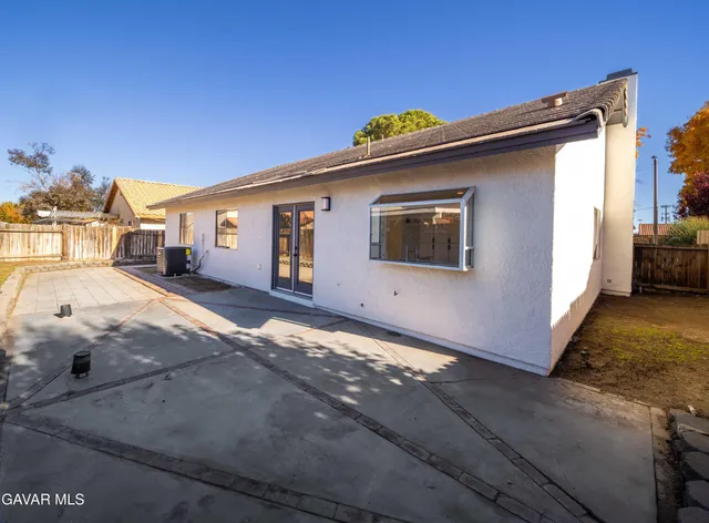 front view of a house with an outdoor space