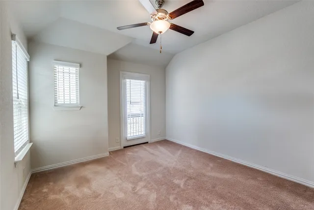 a bathroom with a granite countertop sink mirror and a bathtub