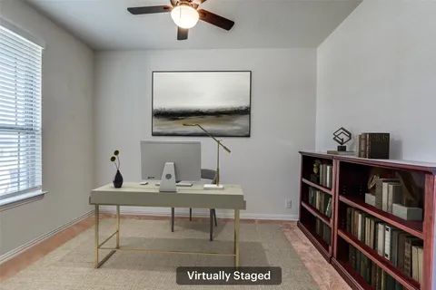 a bathroom with a granite countertop sink a mirror and a shower