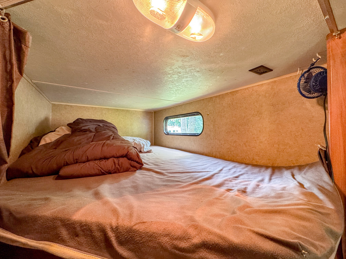 8-110 Woodhaven Sublette, IL 61367 - Photo 12 of 13 a bedroom with a bed and a lamp with the view of entryway
