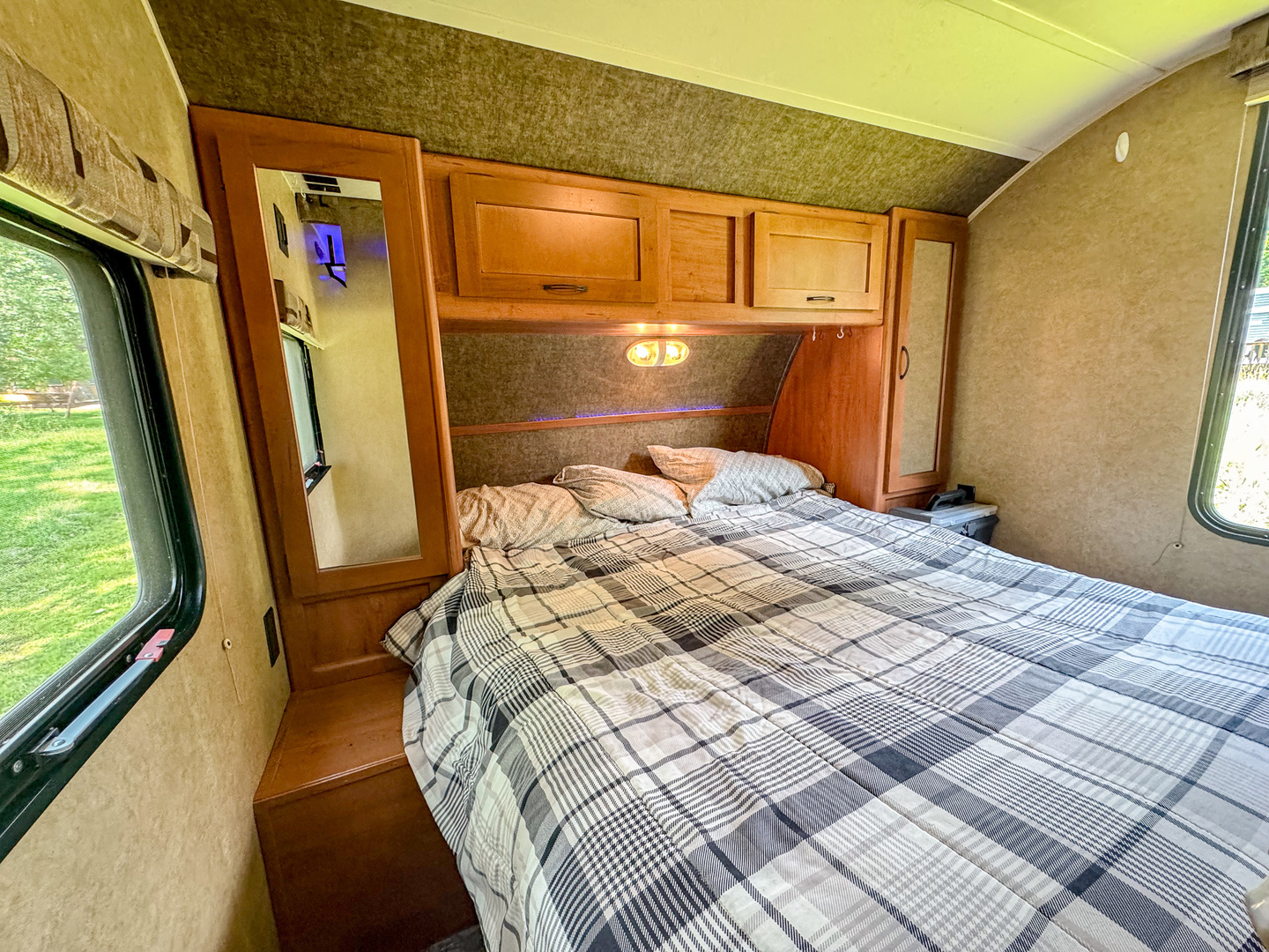 8-110 Woodhaven Sublette, IL 61367 - Photo 9 of 13 a bedroom with a bed next to a window