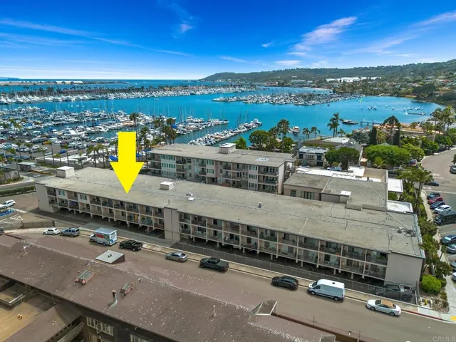 an aerial view of a building with outdoor space