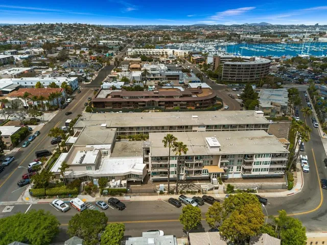 an aerial view of a building with outdoor space