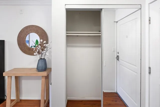 a view of entryway with wooden floor