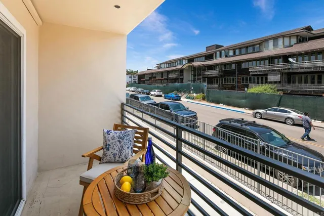 a view of a chairs and table in a patio