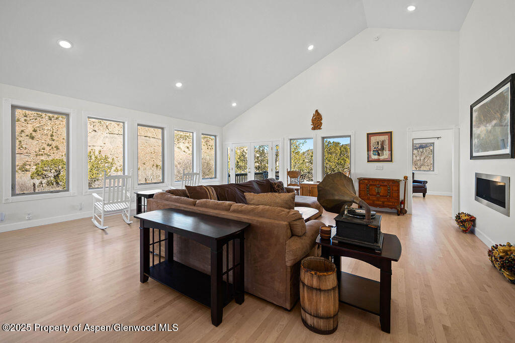 53404 Highway 330 Collbran, CO 81624 - Photo 17 of 43 a view of a livingroom with workspace and a window