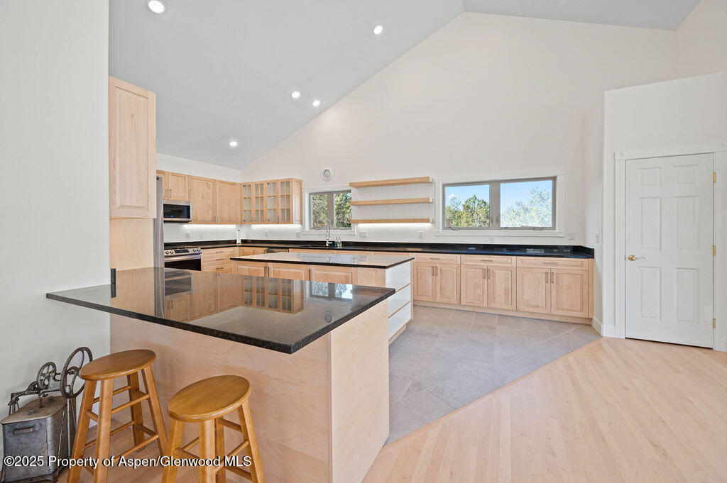 53404 Highway 330 Collbran, CO 81624 - Photo 18 of 43 a kitchen with stainless steel appliances granite countertop a sink and a stove
